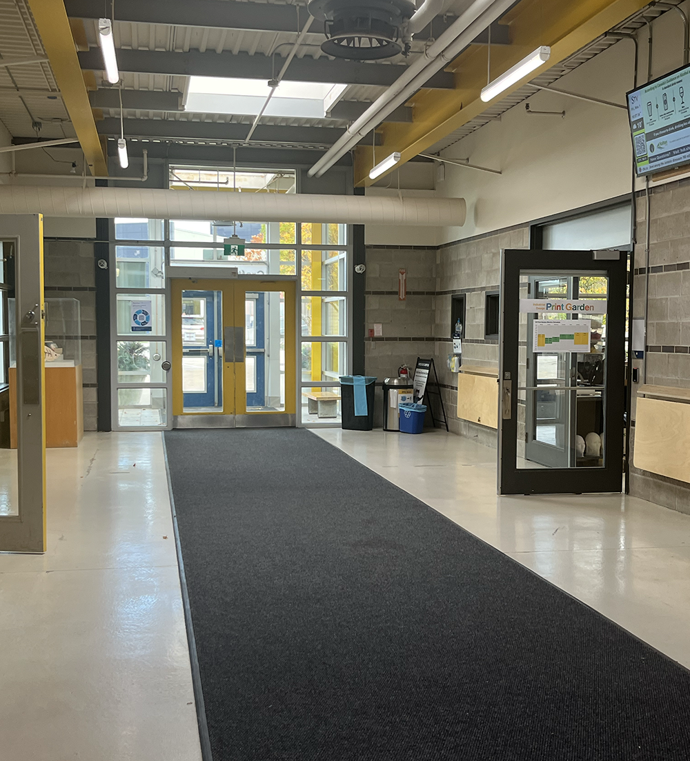 In this corridor, I can design a big decorative sculpture that can be a decoration in school for students to view.